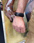 Bracciale con treccia in vero cuoio nero